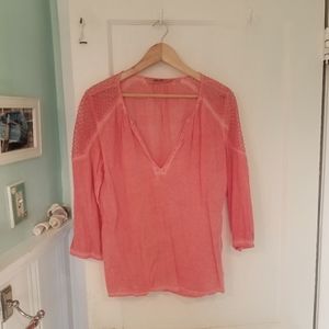 Women's coral orange summer blouse.